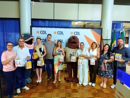 Em visita a Rio Grande, comissão da Fenadoce prestigia o Festimar 2026